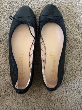 Vera Pelle black quilted leather flats